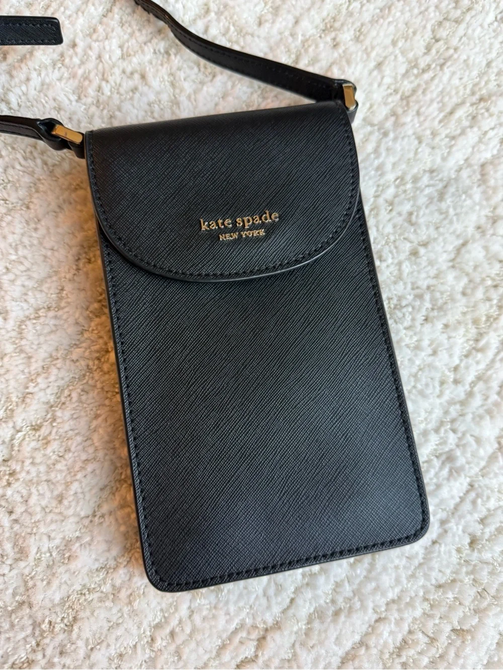kate spade black leather crossbody phone pouch with gold logo